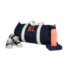 embroidered initials on an organic duffel bag by initially London