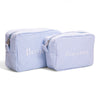 Blue gingham wash bags with an embroidered monogram from Initially London