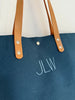 navy blue monogrammed tote bag with leather handles