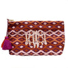 Ikat Wash Bag in reds colour with a large monogram