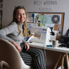 Photo of Holly Woodman who designed the wash bag, including the print