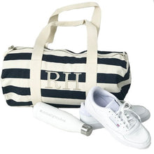 Monogrammed Navy Striped Cotton Duffle Bag made from 100% heavyweight organic cotton. It has a large two letter monogram 