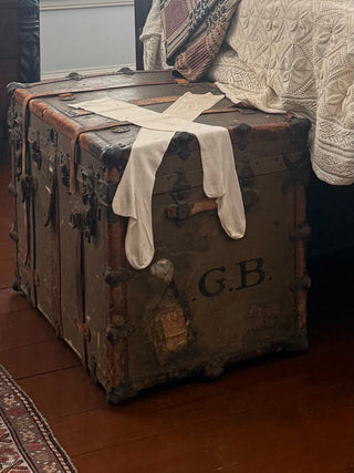 Monogrammed travelling trunk