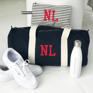 embroidered initials on an organic duffel bag by initially London