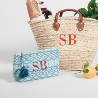 Holly Woodman Textiles wash bag embroidered by Initially London