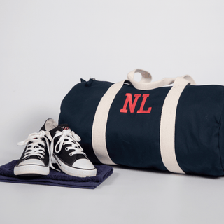 embroidered initials on an organic duffel bag by initially London