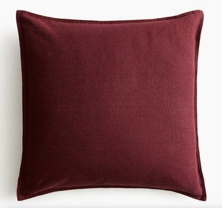Monogrammed linen cushion cover in burgundy