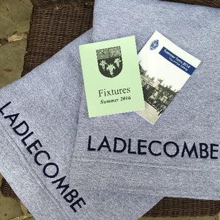 fleece blanket with house name embroidered on it