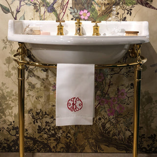 white linen guest towel with embroidered monogram