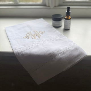 Monogrammed linen towel with punch spoke hemstitch detail