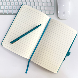 Monogrammed hardbound notebook with embossed monogram