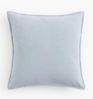 Monogrammed blue linen cushion 
