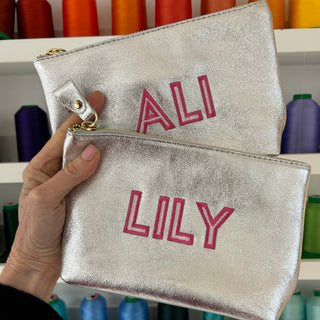 monogrammed silver leather pouch