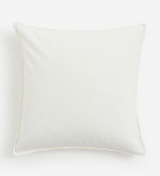 Monogrammed linen cushion in white