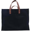 A Navy cotton canvas tote bag, with leather handles without a monogram