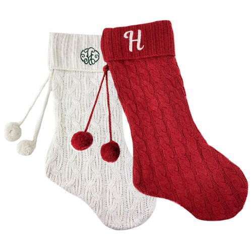 White and red Cable Knit Stockings both with single letter embroidered monograms 