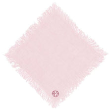 100% linen Fringed Napkins in a pink colour, with a small circle monogram in the corner