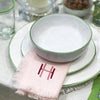 100% linen Fringed Napkins in a pink colour, with a modern monogram. 