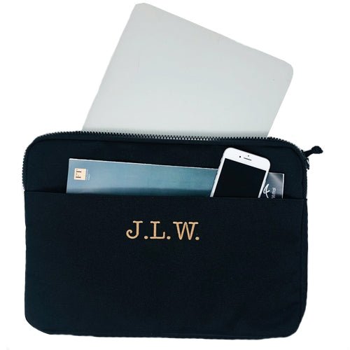 Water-resistant 600D polyester Laptop Cover in Black with a three letter monogram in typewriter font 