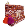 Ikat Wash Bag in reds colour with a large monogram