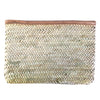 A clutch made from Hand woven from Palm Leaf in Morocco and and features a leather trim and an inside pocket. 