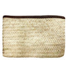 A clutch made from Hand woven from Palm Leaf in Morocco and and features a leather trim and an inside pocket