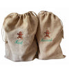 Two 100% Jute Gift Sacks embroidered with a ginger bread men and names underneath - Initially London