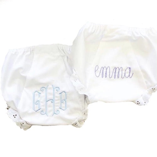 35% cotton batiste and 65% polyester Lacy Nappy Cover with large monograms on the back 