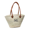 Palm leaf with leather handles Market Basket monogrammed by Initially London. A two letter monogram in font Bodoni 