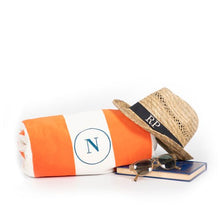 Orange bond stripe Beach Towel monogrammed by Initially London with a large single initial monogram
