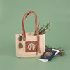 Rattan Bag monogrammed by Initially London. A circle three letter monogram is embroidered onto the leather patch 