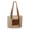 Richmond Rattan Bag made from Made from natural raffia, wound around a wire structure, with adjustable leather handles and accessories - Initially London