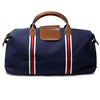 Navy Walton Duffle made from 100% cotton canvas body, cotton webbing straps and vegan leather handles and trim - Initially London