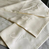 Monogrammed Ivory Mulberry Silk Pillowcase with off-white lettering, made from 22mm mulberry silk with a Charmeuse weave