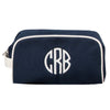 Navy Monogrammed Oakham Wash Bag with a large circle white monogram, made from Heavyweight cotton canvas with a water resistant lining - Initially London 