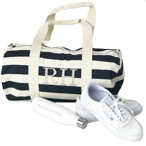 Monogrammed Navy Striped Cotton Duffle Bag made from 100% heavyweight organic cotton. It has a large two letter monogram 