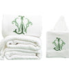 Tasseled Hand Towel made from 100% Turkish cotton. Monogrammed with a two letter, intertwined, traditional monogram. A matching tissue box cover is next to it