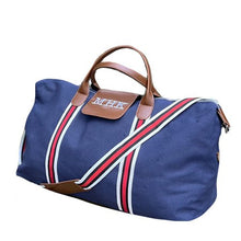 Monogrammed Navy Walton Duffle made from 100% cotton canvas body, cotton webbing straps and vegan leather handles and trim - Initially London