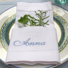 Monogrammed White Hemstitch Napkin made from 100% Pure Linen with a traditional hemstitch border around the edge on top of a plate - Initially London