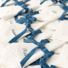 Monogrammed White Hemstitch Napkin made from 100% Pure Linen with a traditional hemstitch border with Blue Ribbons  - Initially London