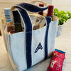 Navy Monogrammed Wiltshire Wine Carrier made from 100% Heavyweight Canvas with Space for Four Wine Bottles on a Countertop  - Initially London