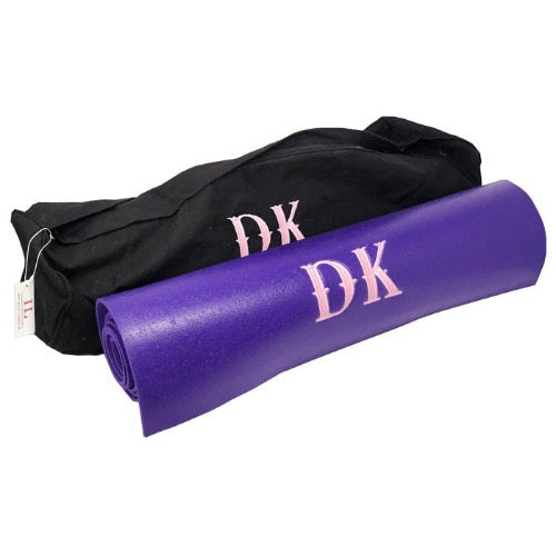 Black 100% Cotton Monogrammed Yoga Mat Carry Bag and Purple Monogrammed Yoga Mat. Both have a two letter monogram in the font Oklahoma 